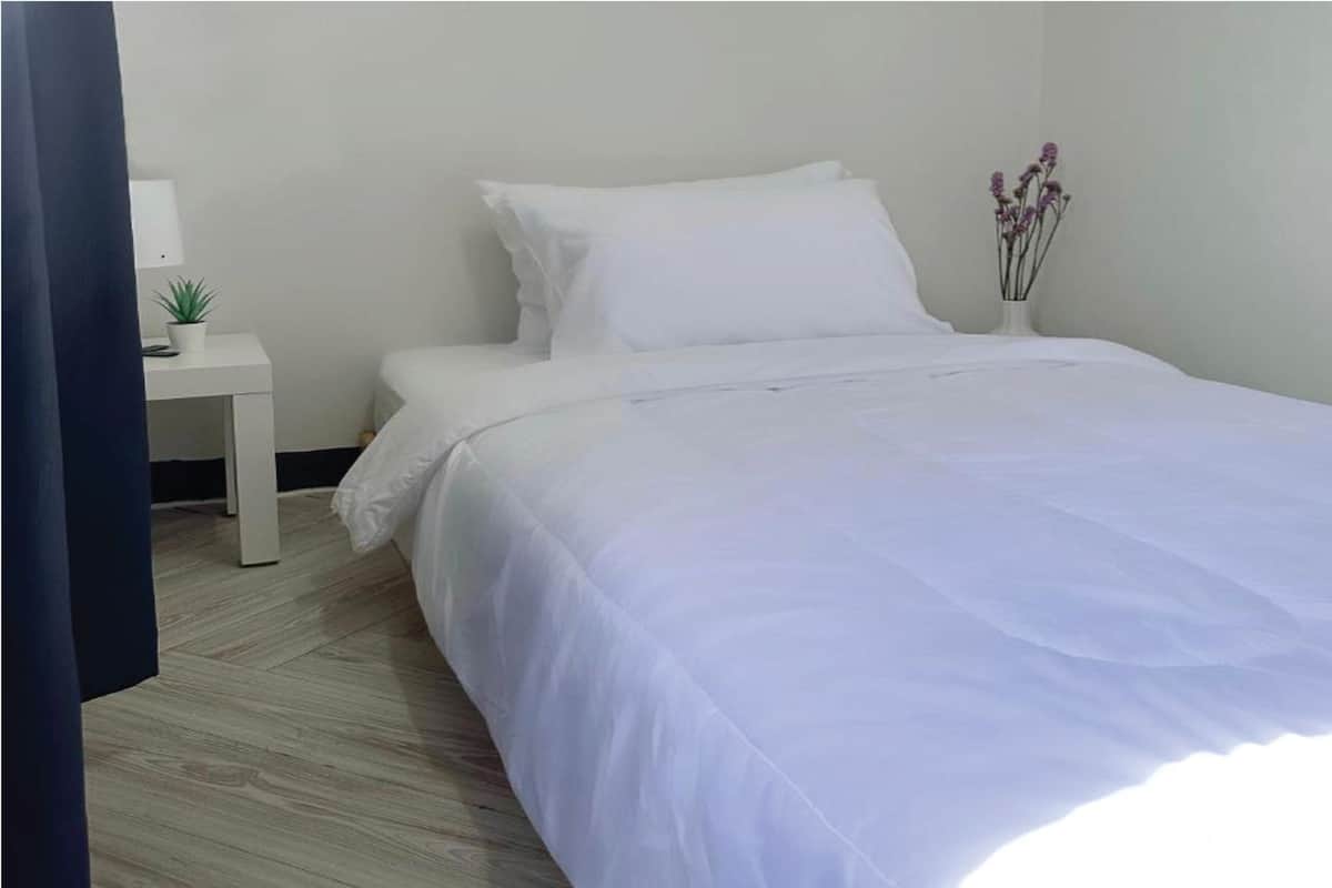Deluxe Family Room | Decoración personalizada, wifi gratis y ropa de cama