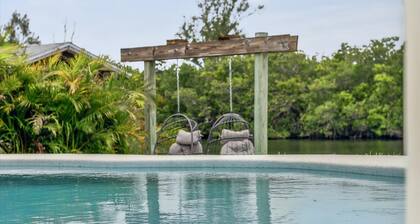 Canal-Front Retreat w/ Pool, Hot Tub & Kayaks to Nature Preserve! 🛶