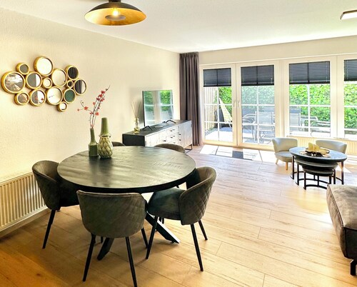 Vacation home with fenced garden near the beach for 6 people & dogs welcome