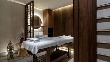Experience serenity in this spa room, featuring a reception desk, mirror, and comfortable bench for relaxation.