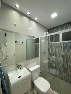 Hair dryer, towels, soap, toilet paper