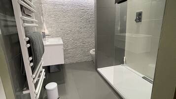 Hair dryer, towels, soap, shampoo