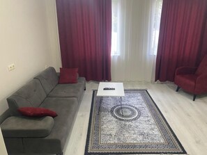 Deluxe Condo | Living area