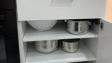 Comfort Apartment | Private kitchen | Full-sized fridge, microwave, oven, stovetop