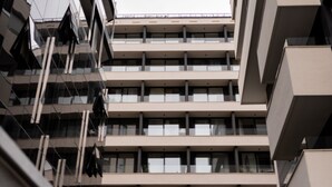 A multi-story building with a modern architectural design, featuring balconies and large windows. - City Residences (Dubrovnik)