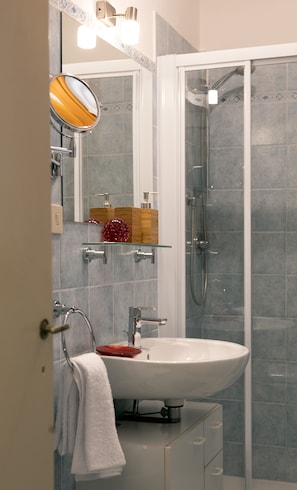 Hair dryer, towels, toilet paper