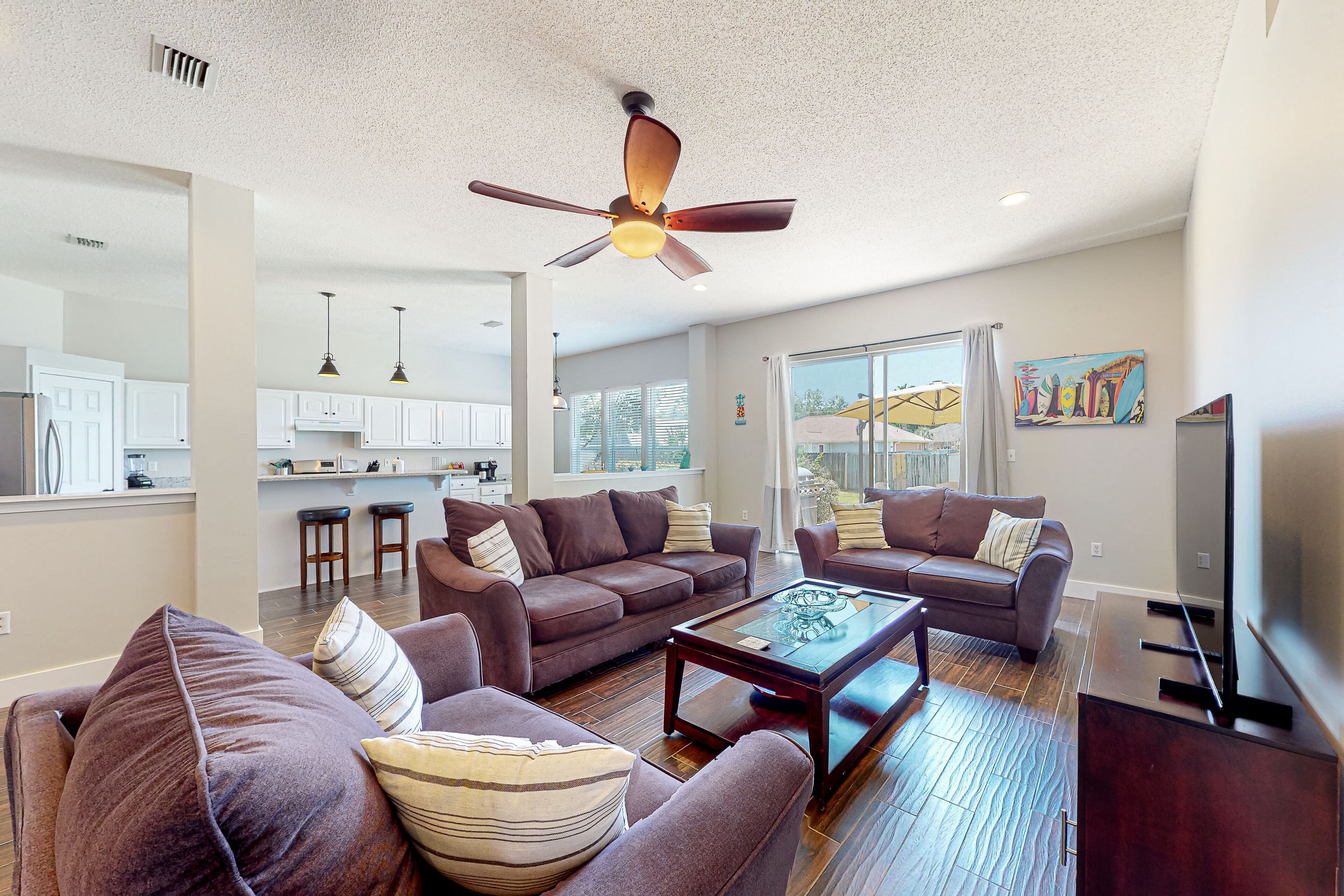 Sunny home near the beach with patio, grill, washer/dryer, central AC, & WiFi