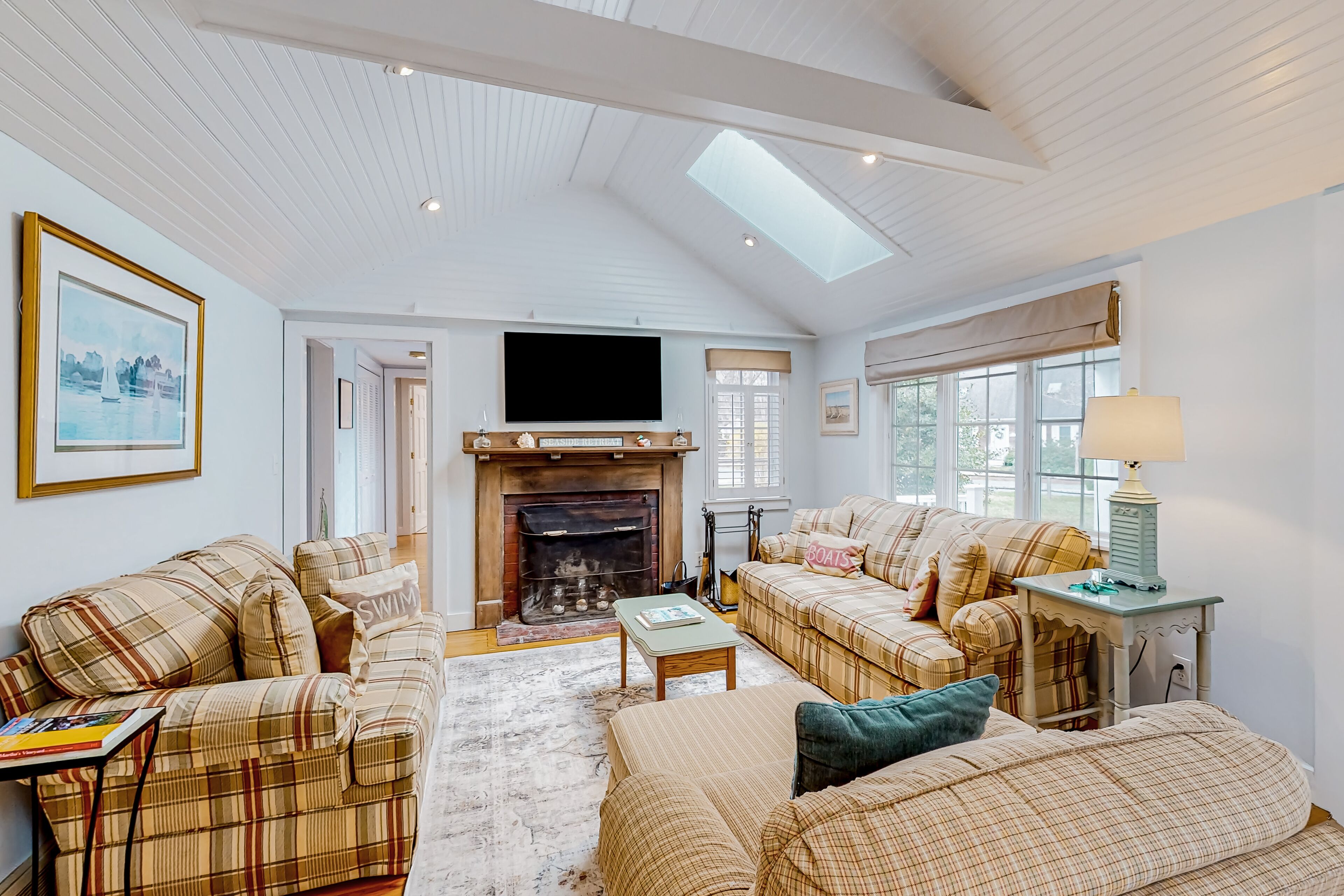 Tree-lined home with lovely yard, decks & private beach access - walk to town