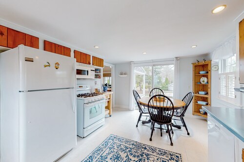 Tree-lined home with lovely yard, decks & private beach access - walk to town