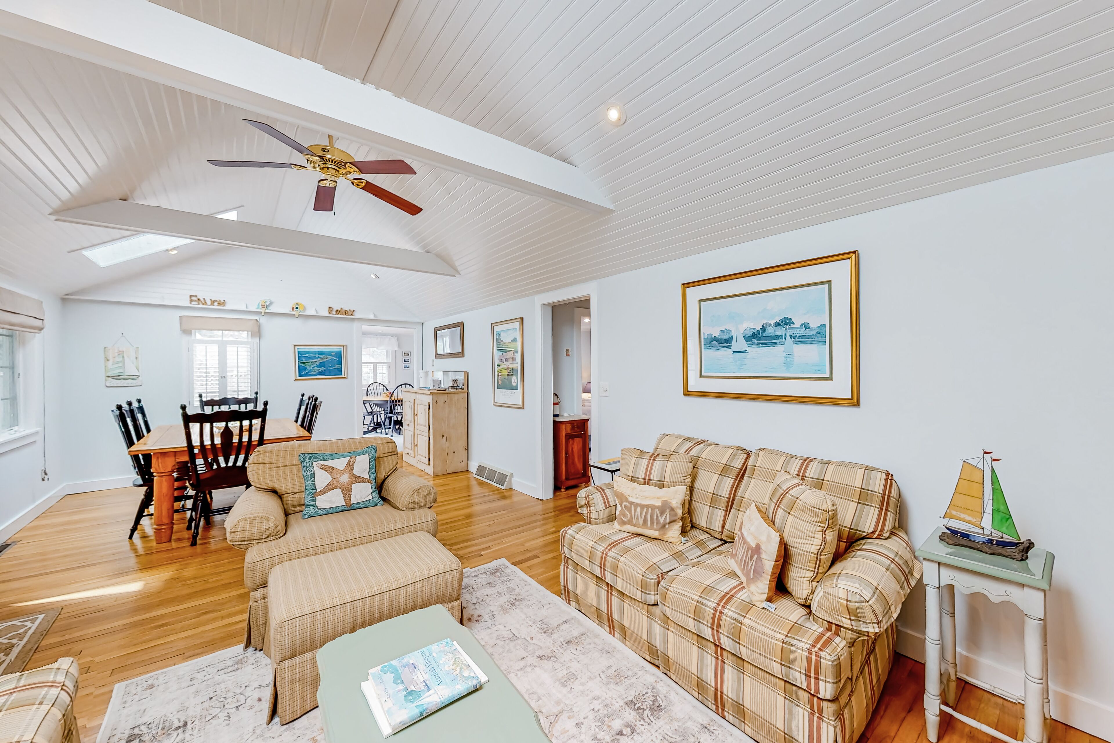 Tree-lined home with lovely yard, decks & private beach access - walk to town