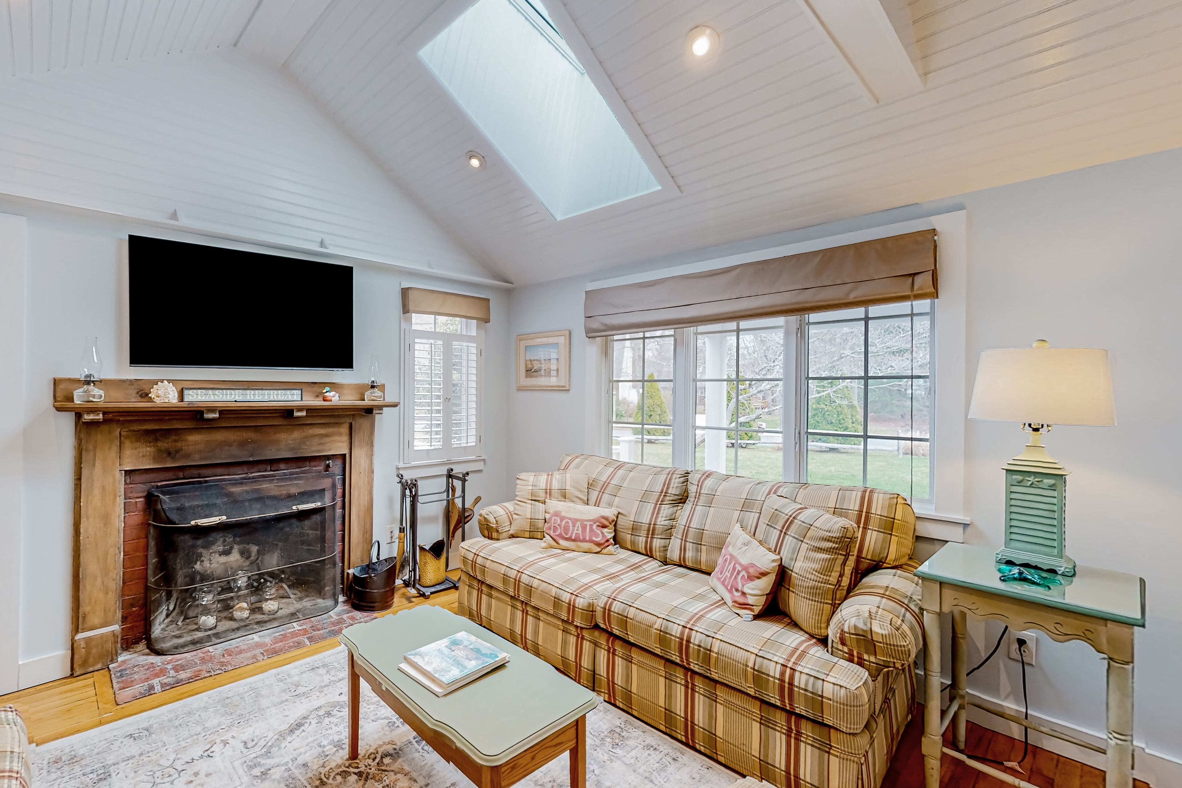 Tree-lined home with lovely yard, decks & private beach access - walk to town