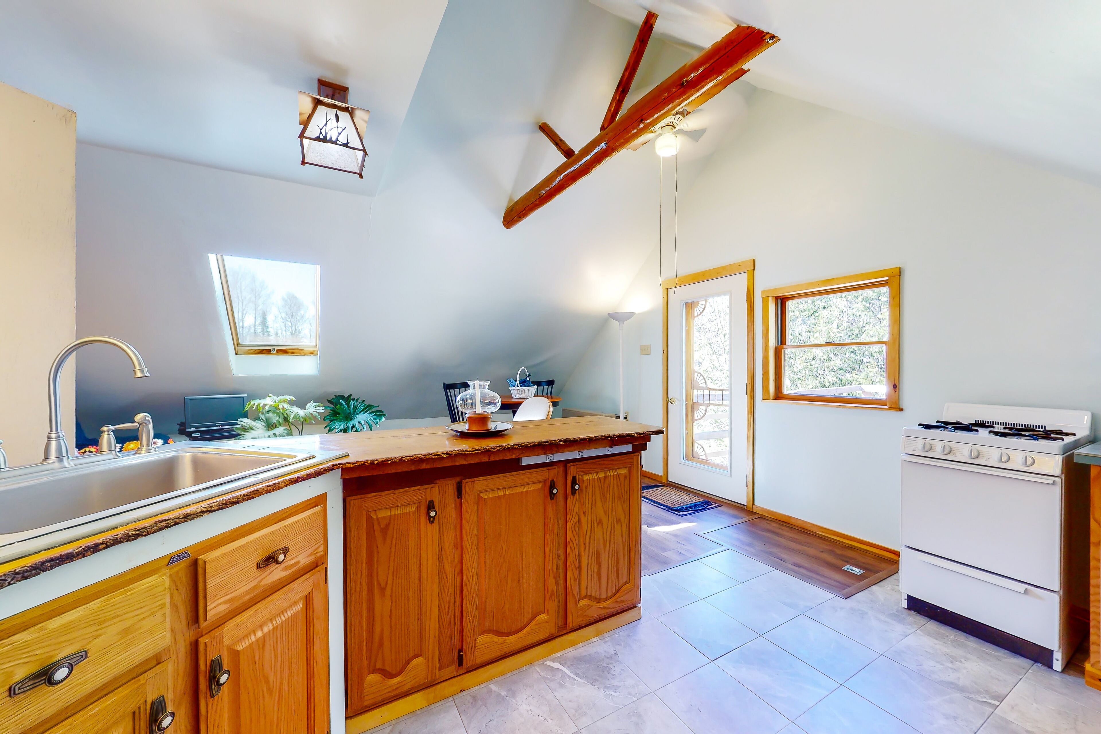 Charming homestead with a rooftop deck, firepit, & well-equipped kitchen