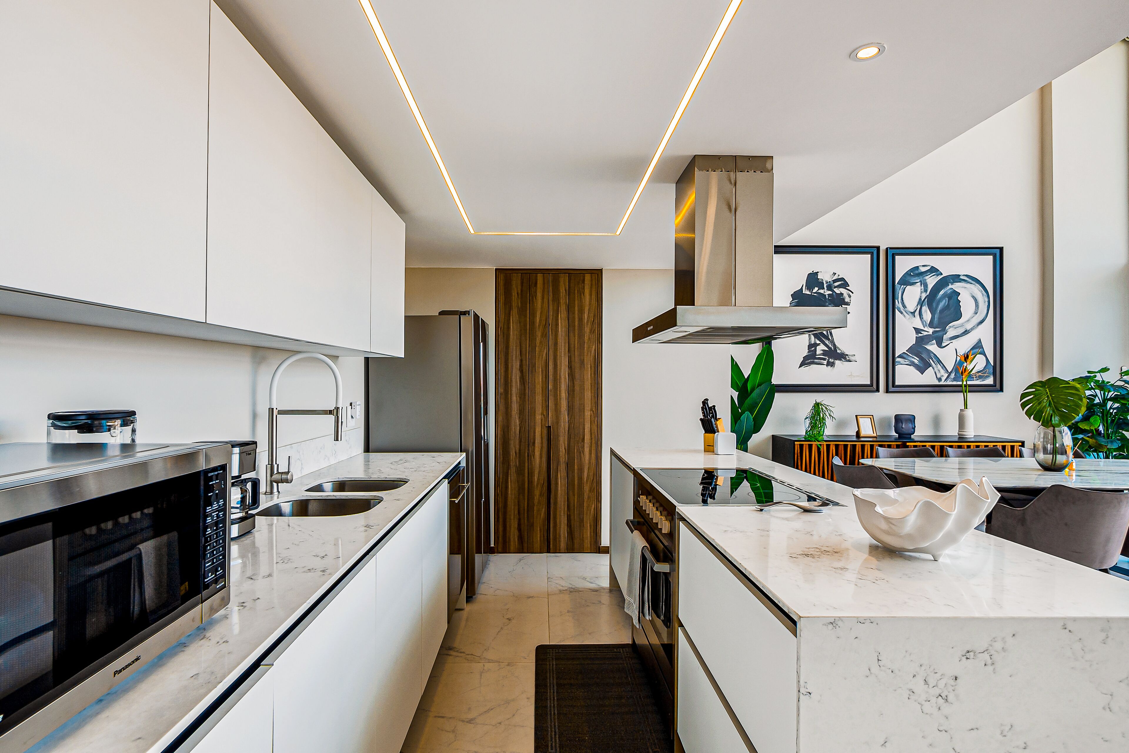 Luxury ocean-view condo with resort pool, private balcony, and washer/dryer