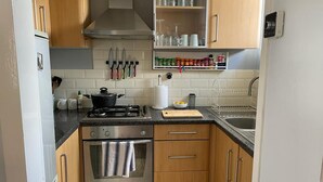 Lägenhet - 1 queensize-säng med bäddsoffa | Eget kök