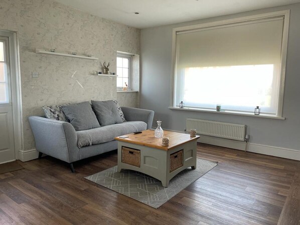 Apartment, 1 Queen-Bett und Schlafsofa | Wohnbereich