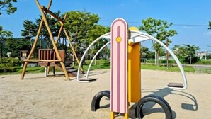 A playground with a swing set and a climbing structure. - Daejeon Bedroom 3, Bathroom 2, Spacious Living Room Free Parking (Pasay)