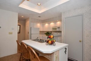 Condo, 3 Bedrooms | Private kitchen | Fridge, oven, coffee/tea maker, toaster