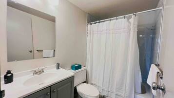 Hair dryer, towels, soap, shampoo