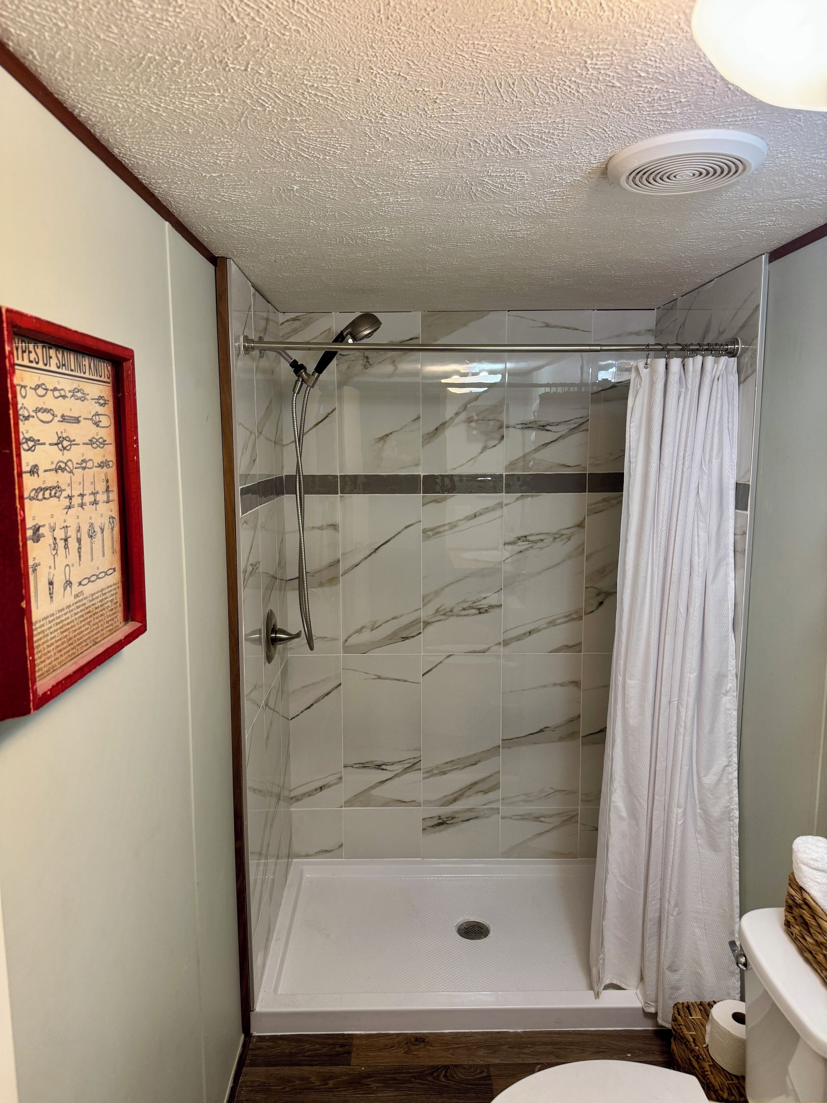 Hair dryer, towels, soap, toilet paper