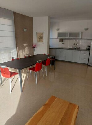 Enjoy meals in this dining area with a rectangular table and six chairs.