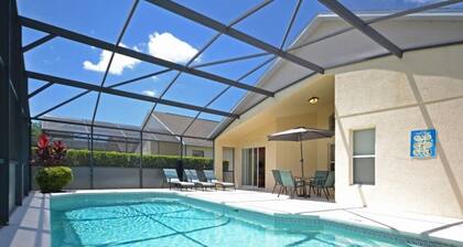 South facing pool home with games room - gated community