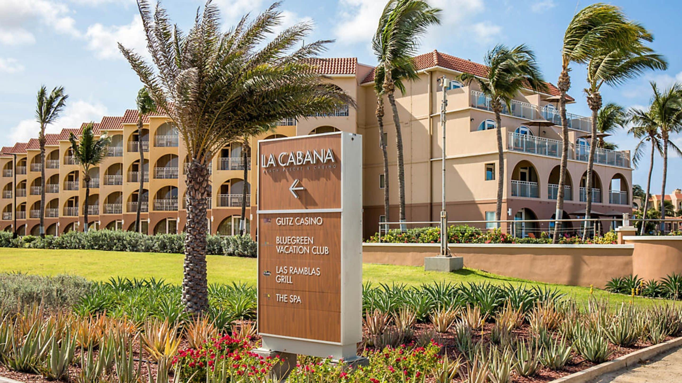 A sign for La Cabana with amenities including a Glitz Casino, Bluegreen Vacation Club, Las Ramias Grill, and The Spa.