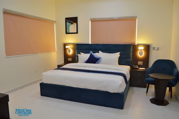 Habitación Deluxe doble | Ropa de cama de alta calidad y colchones Tempur-Pedic