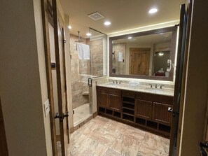 Shower, rainfall showerhead, hair dryer, towels