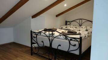 Apartment, Multiple Beds | 2 bedrooms, iron/ironing board, free WiFi, bed sheets