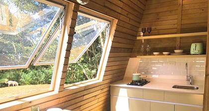 The Shire Glamping - nestled among lush trees, tranquil atmosphere