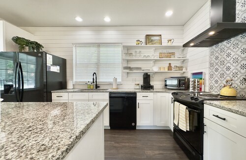 Pet Friendly Historic Downtown Bungalow with Fenced In Yard!