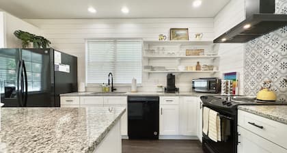 Pet Friendly Historic Downtown Bungalow with Fenced In Yard!