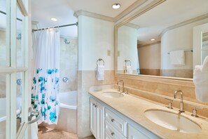 Combined shower/bathtub, hair dryer, towels - #403 Oceanview beachfront Maxwell Beach Villas (Christ Church)
