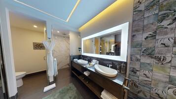 Hair dryer, towels, soap, shampoo