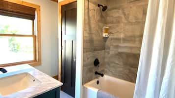 Hair dryer, towels, soap, shampoo