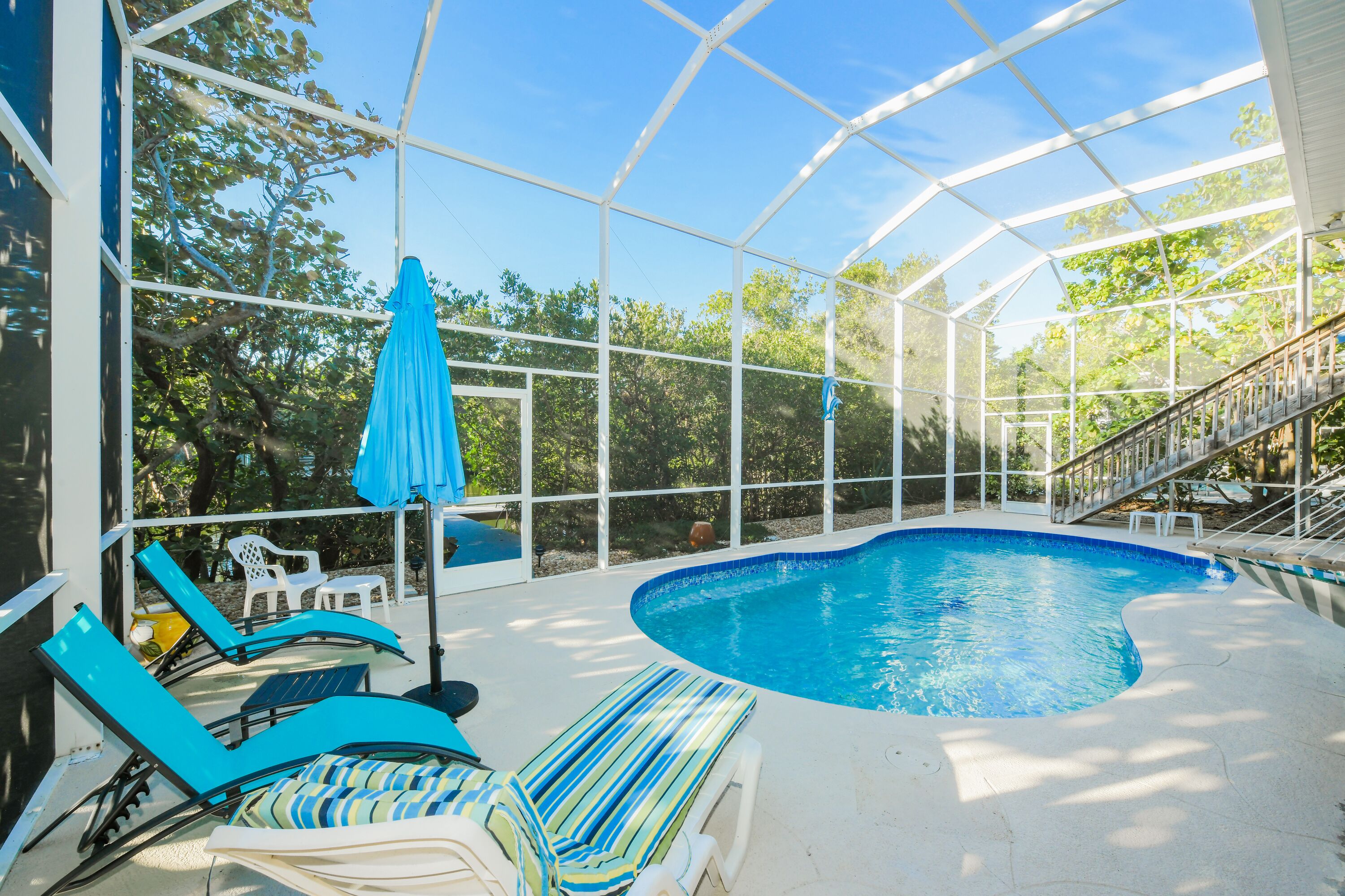 Canal Front Home with Dock, Saltwater Pool, Ping Pong - Ama Maria