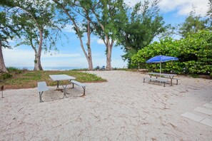 Outdoor dining - Beach Front Duplex! With Direct Beach Access and Scenic Views (Holmes Beach)