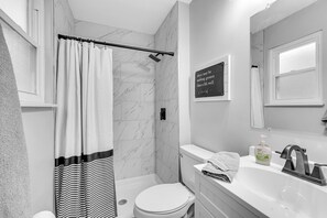Shower, hair dryer, towels, soap