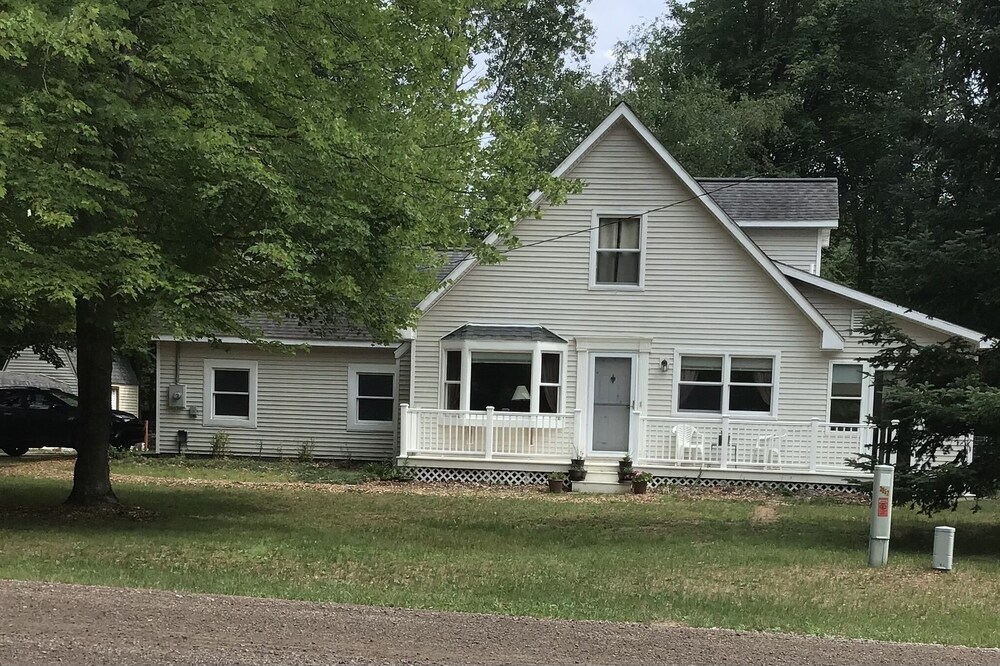 Roomy home with spacious fenced in backyard and fire pit.