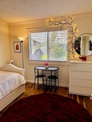 1 bedroom, desk, iron/ironing board, travel crib