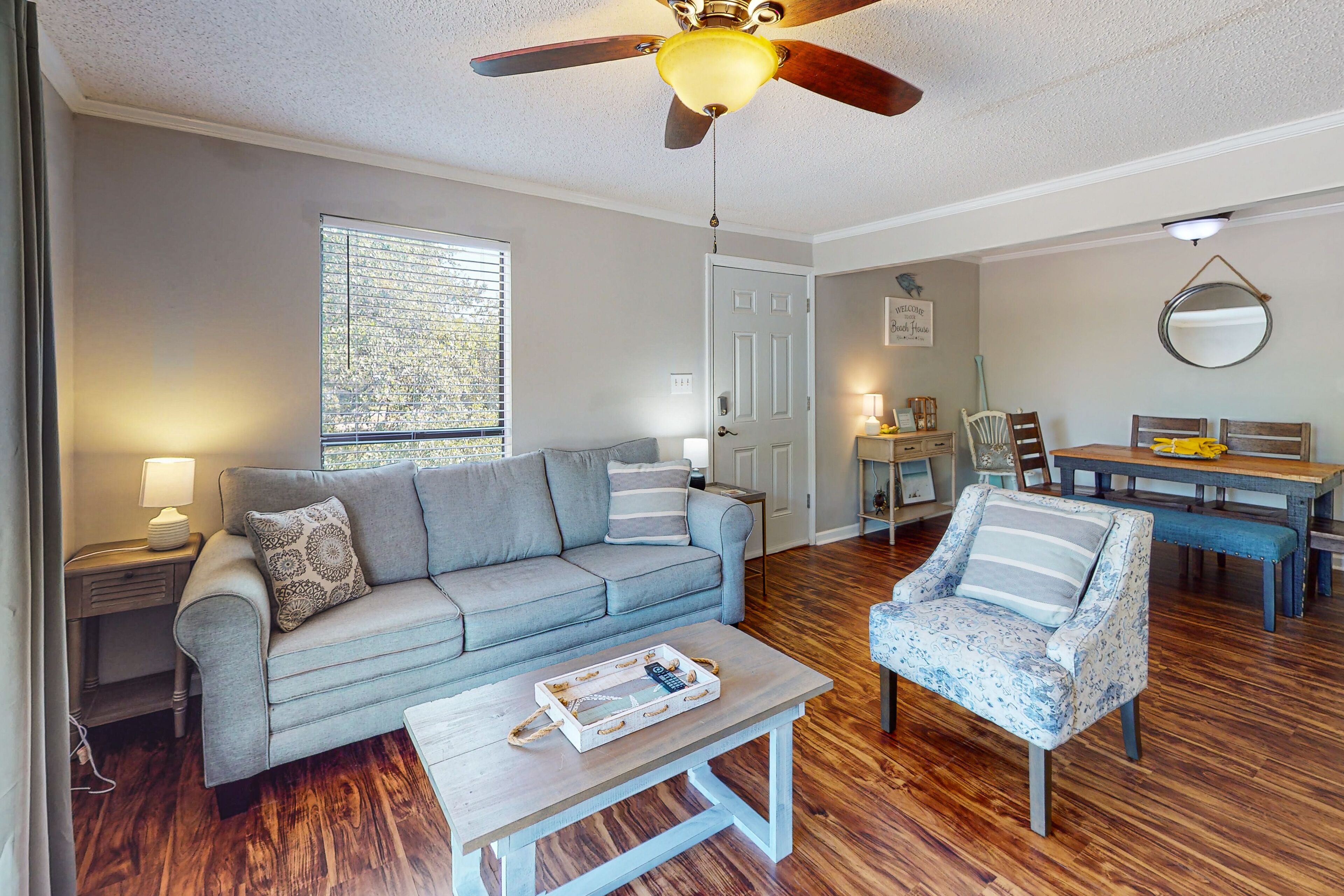 Quiet condo with pool, balcony, TV, full kitchen, & washer/dryer