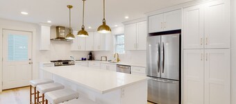 Coastal retreat steps to the beach with smart TVs, desk, grill, children's items