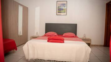 Habitación triple | Camas Select Comfort, cortinas blackout, cunas gratuitas y wifi gratis