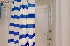 Combined shower/tub, hair dryer, towels, soap