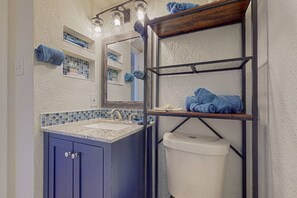 Combined shower/bathtub, hair dryer, towels, soap