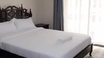 Memory-foam beds, blackout curtains, iron/ironing board, free WiFi