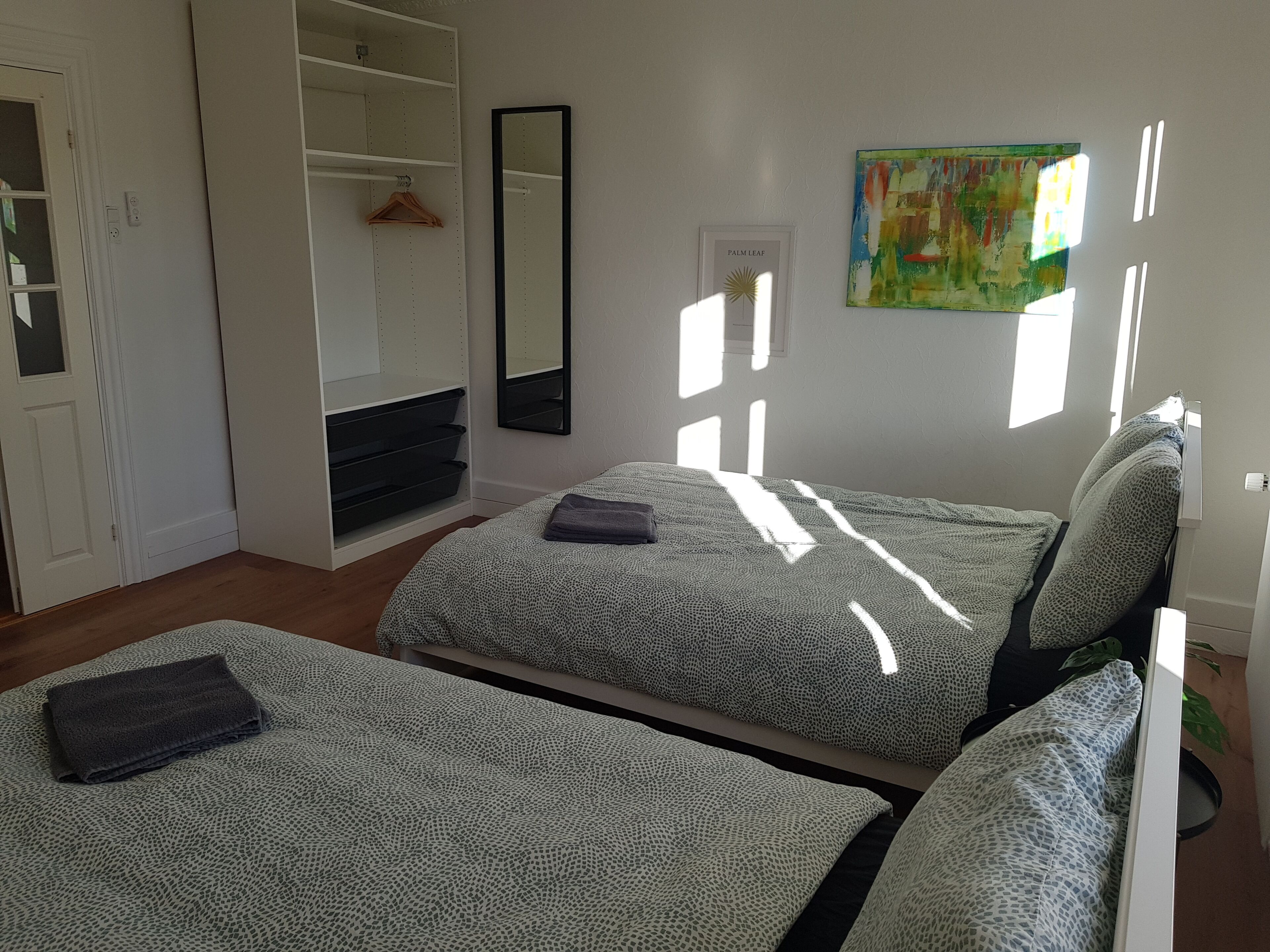 Down duvets, desk, laptop workspace, blackout curtains