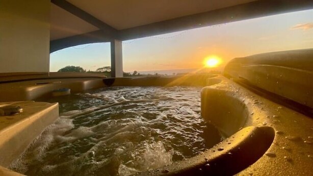 A hot tub with a view of the sunset. - Ocean View Villa with Infinity Pool, Hot Tub & Fire Pit; 5 Min from Beach (Rincón)