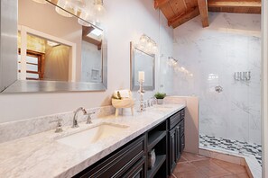 Bathtub, hair dryer, towels, soap