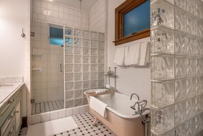 Bathtub, hair dryer, towels